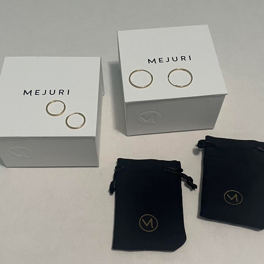 2 pairs of 14k solid gold mejuri hoops (small hoops and between hoops)